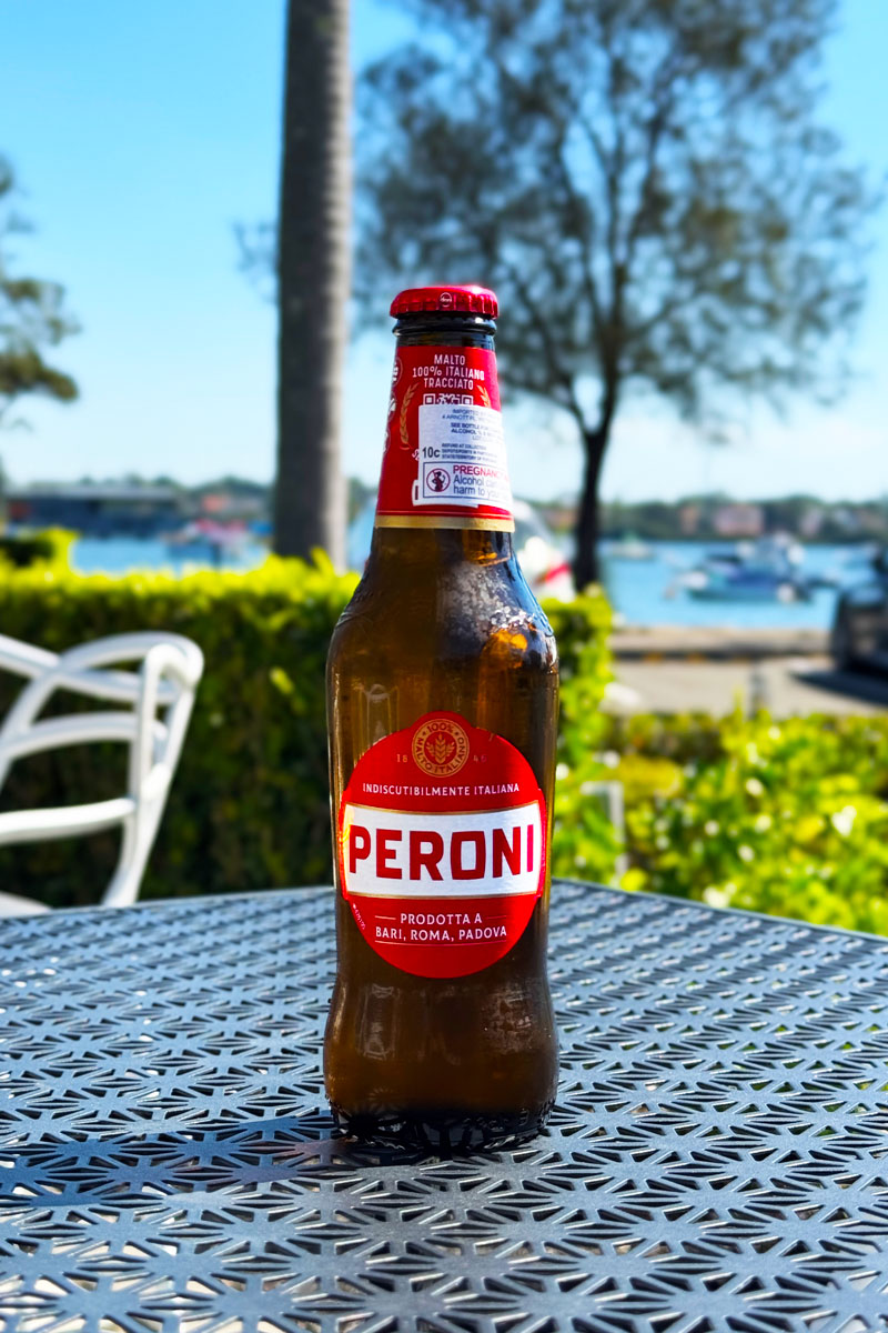 Peroni Beer on table outside at Montage Piazza